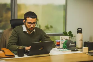 Repstack Employee with Headphones