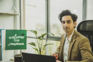 Repstack Employee Sitting in Office