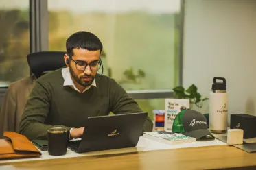 Repstack Employee with Headphones